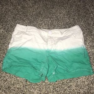 Green and white jean shorts